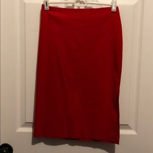 Red pencil midi skirt with side opening